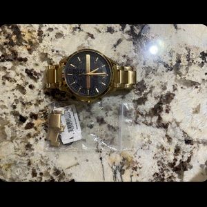Gold Armani X-Change stylish watch